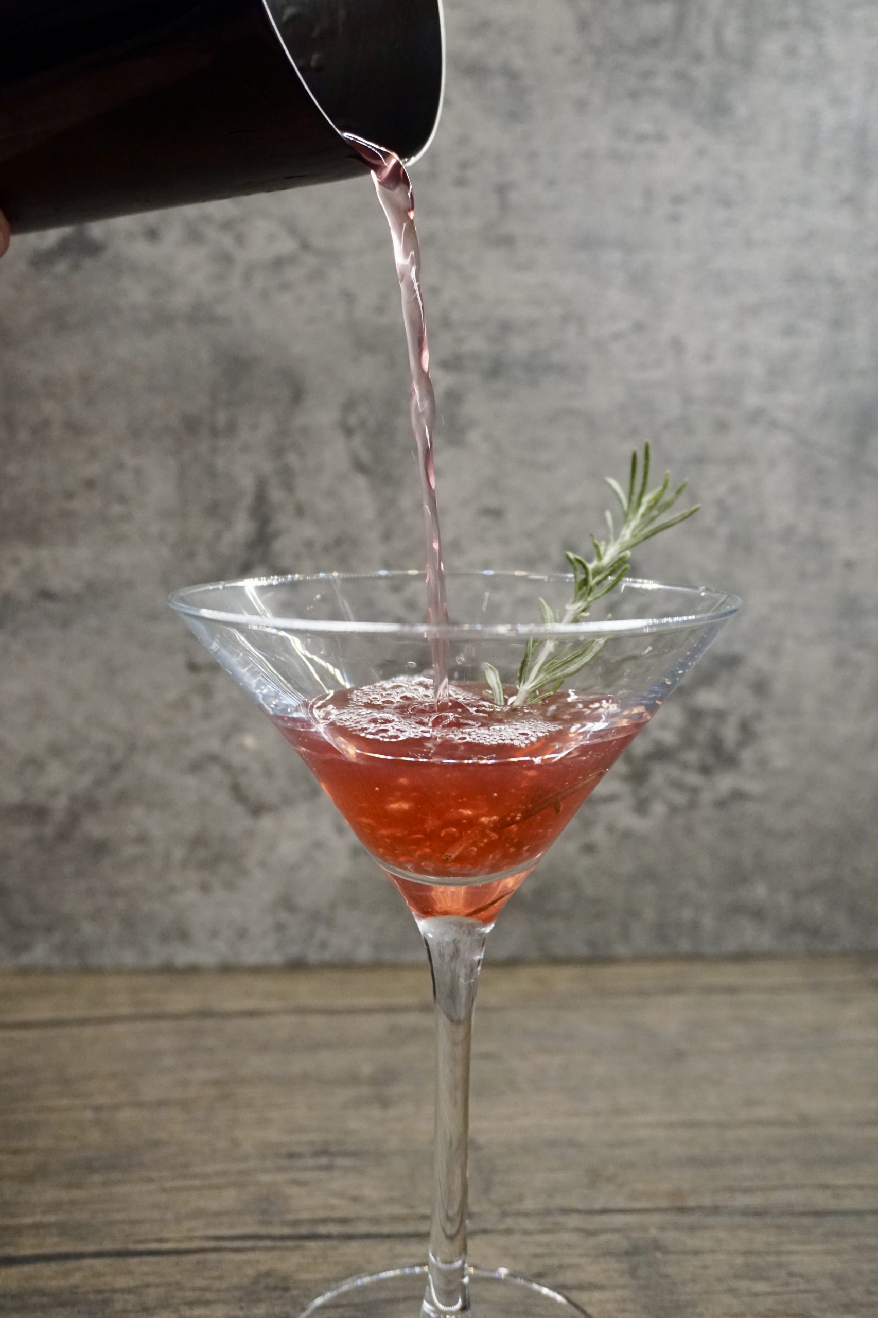 Elegant cocktail with rosemary garnish served by private chef in Tenerife