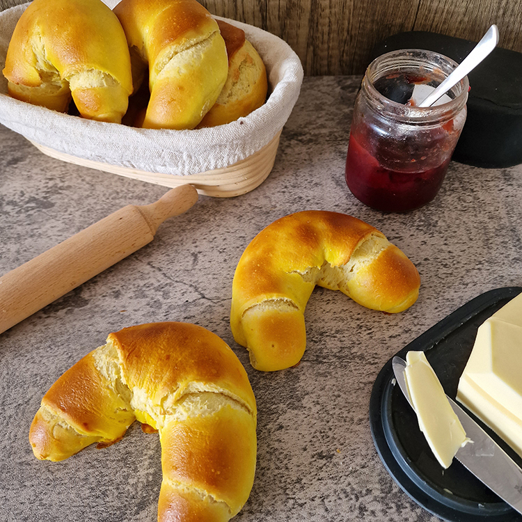 Freshly baked croissants served with butter and homemade jam for a private chef brunch in Tenerife.